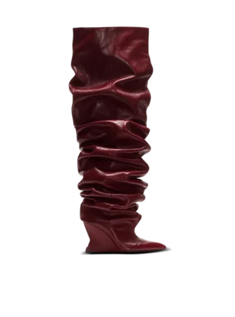 Bottes cuissardes à talons compensés