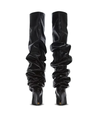 Bottes cuissardes à talons compensés