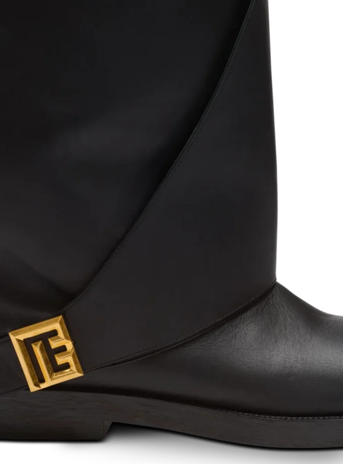Bottes plates en cuir torsadé Bottes plates en cuir torsadé