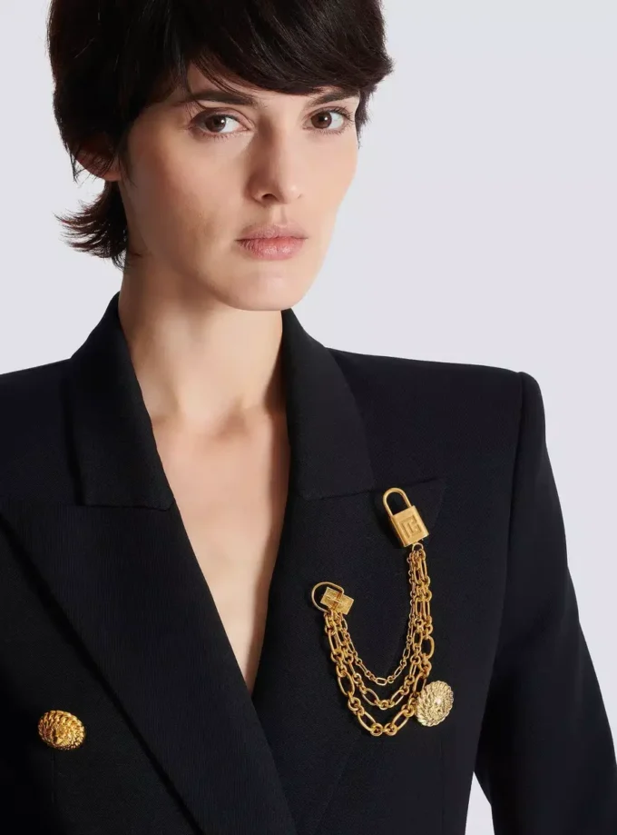 Broche Sync en laiton avec chaînes