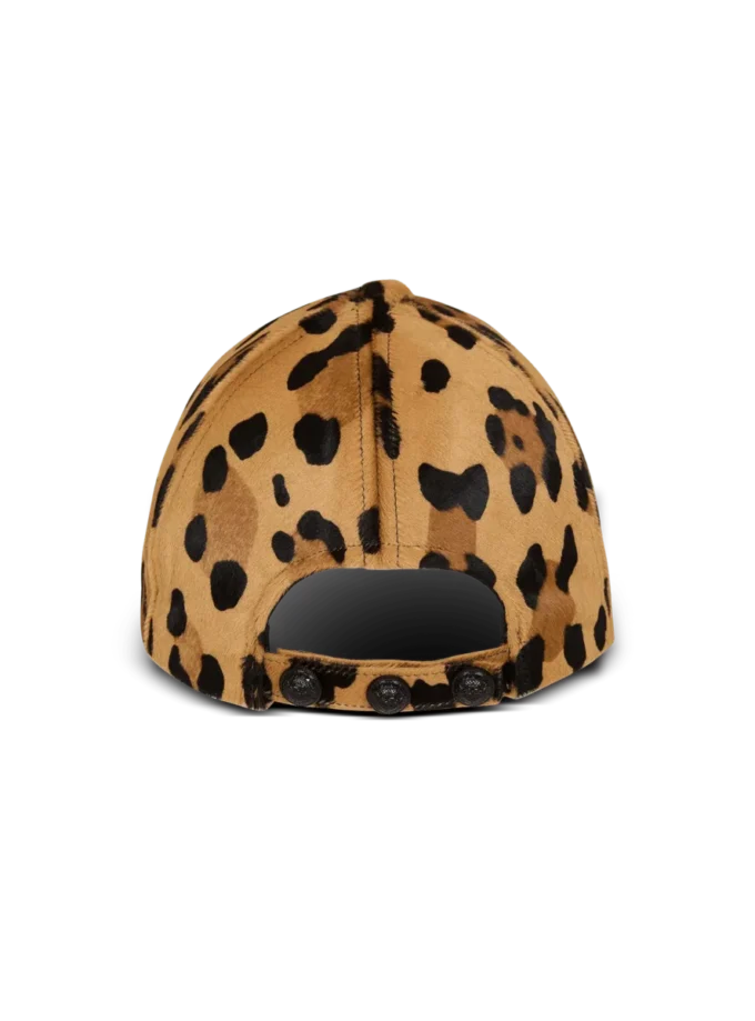 Casquette en cuir façon poney à motif léopard Casquette en cuir façon poney à motif léopard