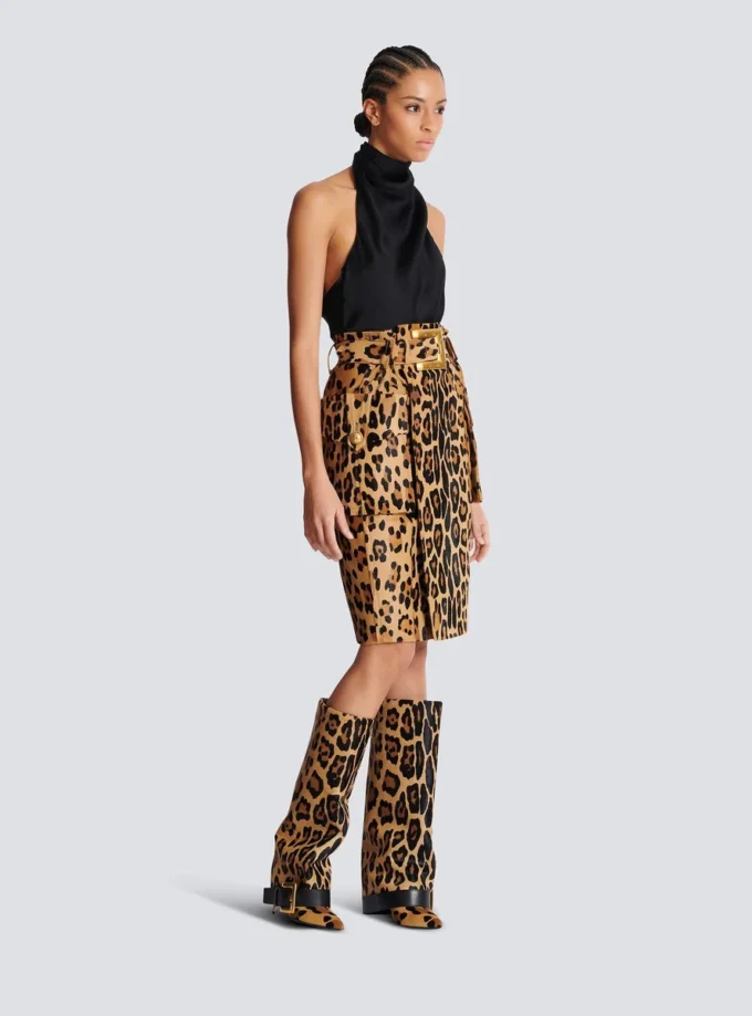 Jupe midi en cuir façon poney à motif léopard Jupe midi en cuir façon poney à motif léopard