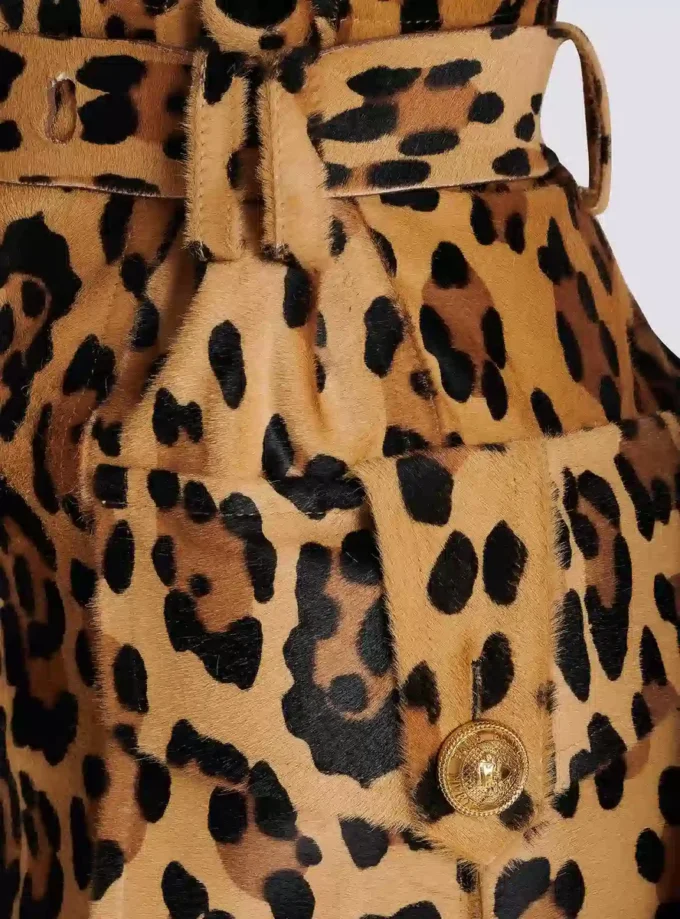 Jupe midi en cuir façon poney à motif léopard Jupe midi en cuir façon poney à motif léopard