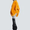 Manteau en peau lainée avec ceinture