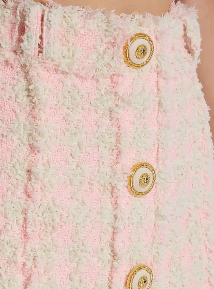 Mini-jupe en tweed boutonnée à taille haute Mini-jupe en tweed boutonnée à taille haute