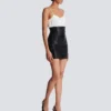 Mini-jupe taille haute en cuir d’agneau roulé Mini-jupe taille haute en cuir d’agneau roulé