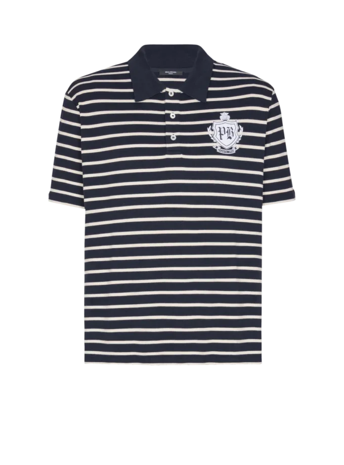 Polo rayé avec emblème universitaire Polo rayé avec emblème universitaire
