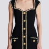 Robe en tweed avec bordure en perles Robe en tweed avec bordure en perles