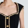Robe en tweed avec bordure en perles Robe en tweed avec bordure en perles