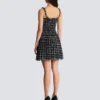 Robe en tweed à bretelles chaînes Robe en tweed à bretelles chaînes