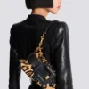 Sac Anthem Mini en cuir de poney imprimé léopard Sac Anthem Mini en cuir de poney imprimé léopard