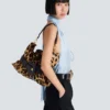 Sac Anthem moyen en cuir de poney imprimé léopard Sac Anthem moyen en cuir de poney imprimé léopard