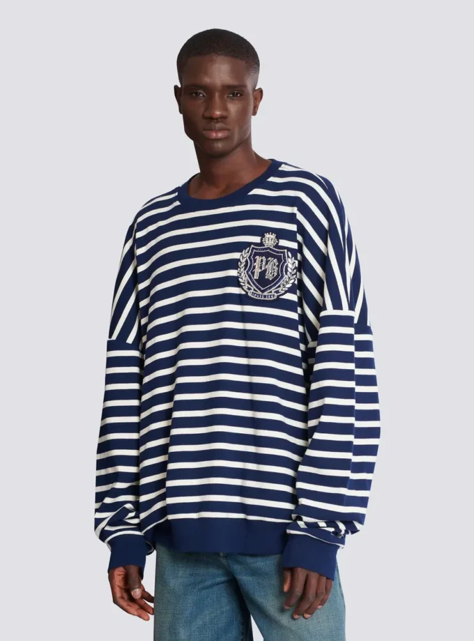Sweat-shirt en coton avec emblème universitaire et rayures bretonnes Sweat-shirt en coton avec emblème universitaire et rayures bretonnes