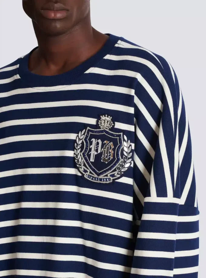Sweat-shirt en coton avec emblème universitaire et rayures bretonnes Sweat-shirt en coton avec emblème universitaire et rayures bretonnes