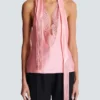 Top en satin à franges et dos nu Top en satin à franges et dos nu