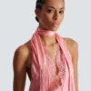 Top en satin à franges et dos nu Top en satin à franges et dos nu