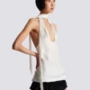 Top en satin à franges et dos nu