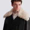 Veste en cuir avec col en peau lainée Veste en cuir avec col en peau lainée