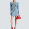 Veste en denim avec bordure en perles