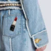 Veste en denim avec bordure en perles