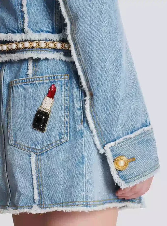 Veste en denim avec bordure en perles