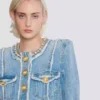 Veste en denim avec bordure en perles
