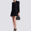 Veste en tweed à 6 boutons Veste en tweed à 6 boutons
