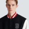 Veste universitaire en laine et simili cuir Veste universitaire en laine et simili cuir