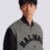 Veste universitaire monogrammée avec empiècements Veste universitaire monogrammée avec empiècements